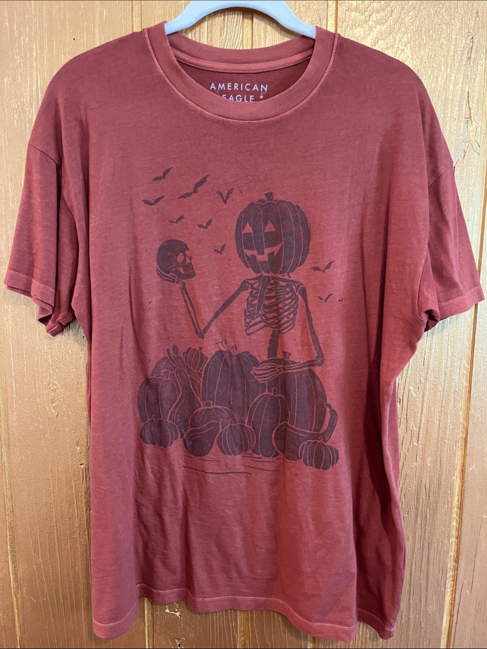American Eagle Outfitters burnt orange Pumpkin Skeleton Short Sleeve Tee